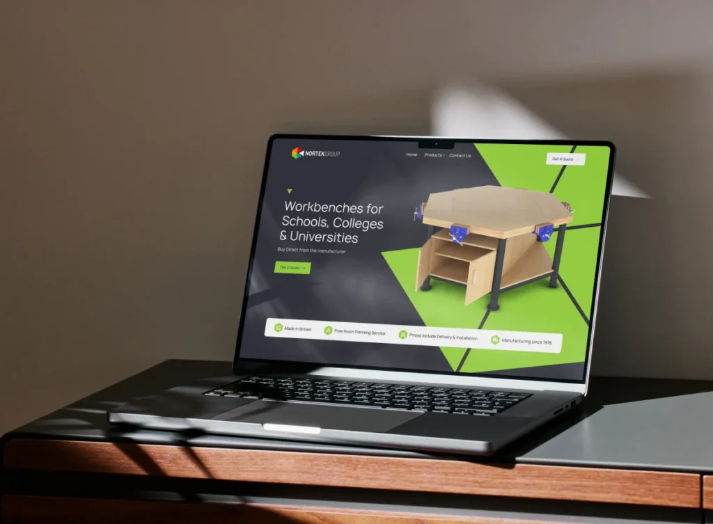 website development created for a manufacturing organisation shown on a laptop