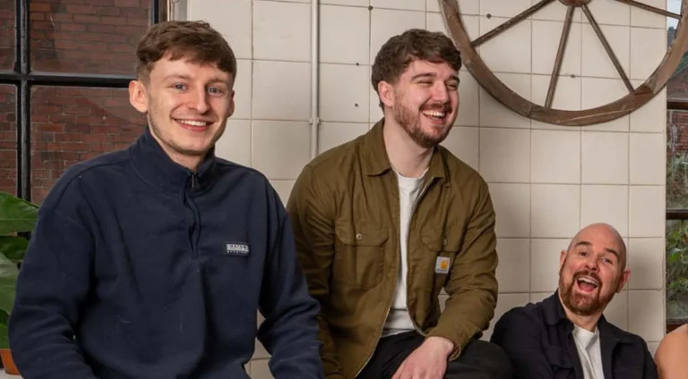 web design agency team smiling together