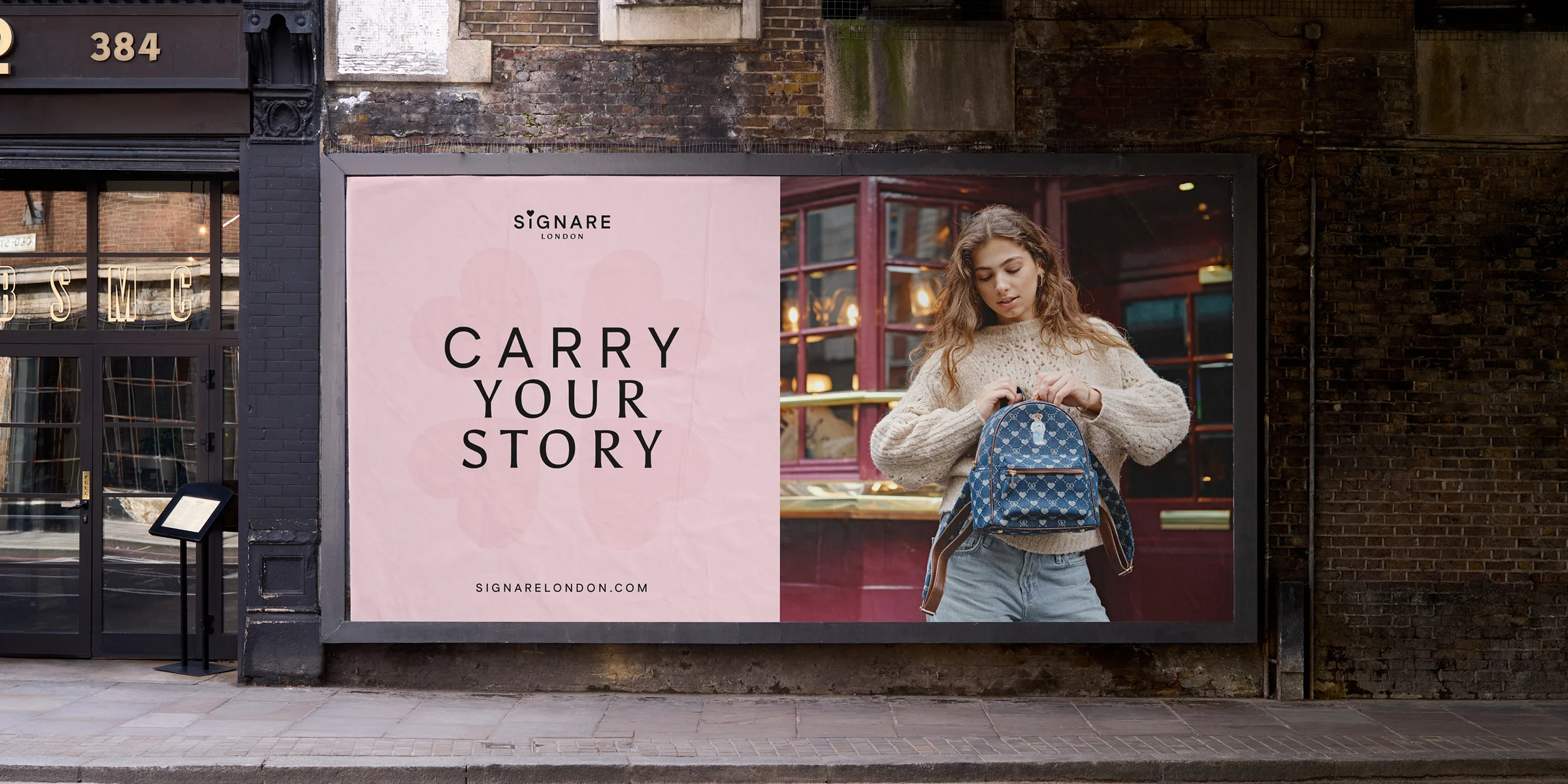 Billboard with a Signare London advert