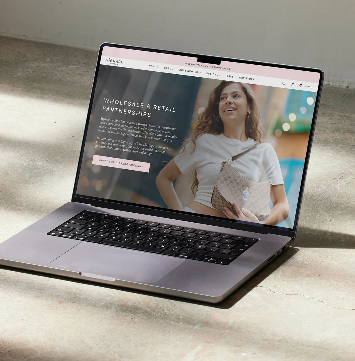 Laptop showing the wholesale enquiries page for Signare London