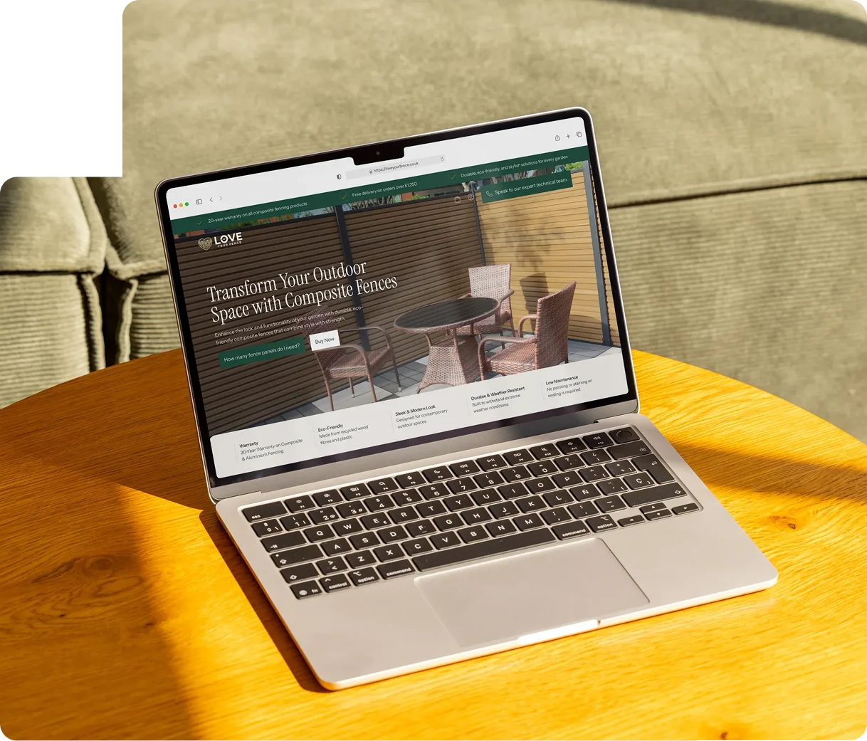 website design for fencing sales on laptop