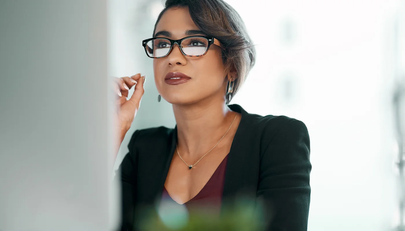 business owner using desktop researching what does an seo agency do