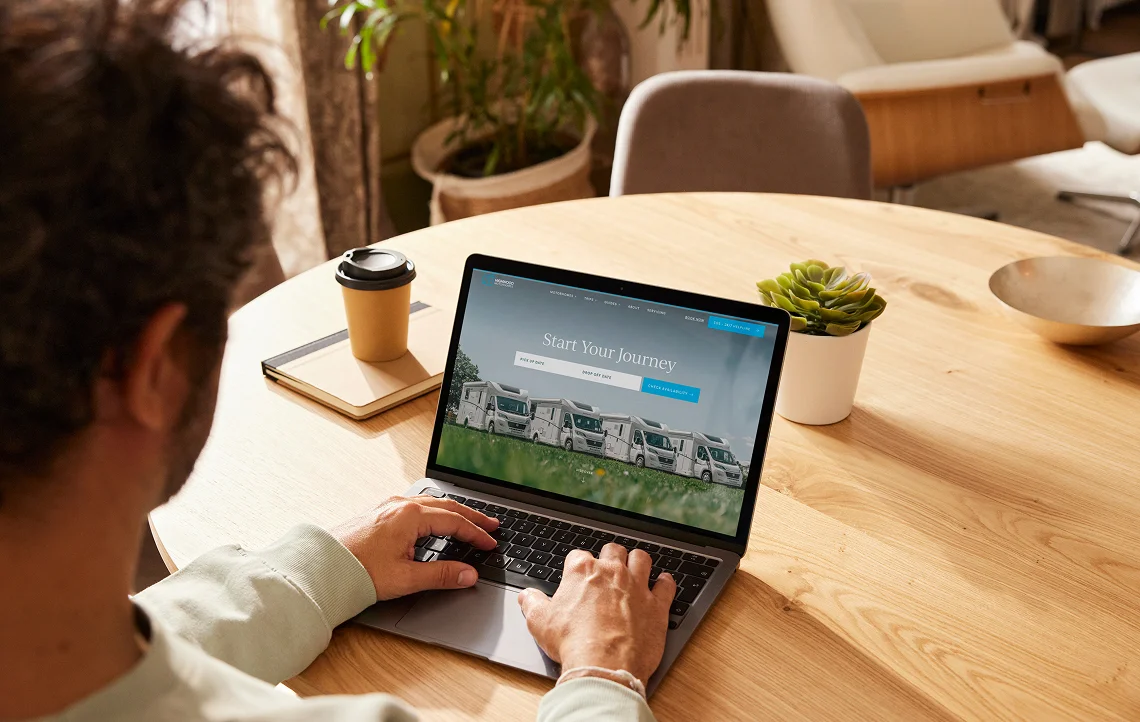 website design for a motorhome hire business displayed on a laptop
