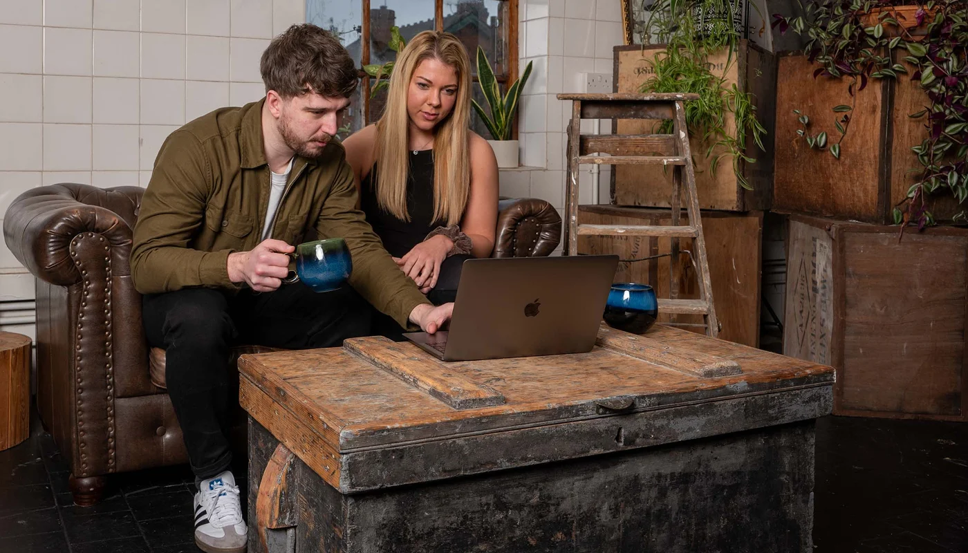 ux designer showing designs to a client