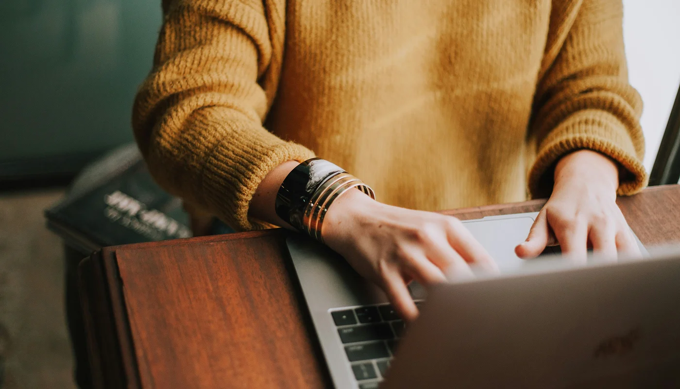 digital marketer using a laptop to create a website content strategy